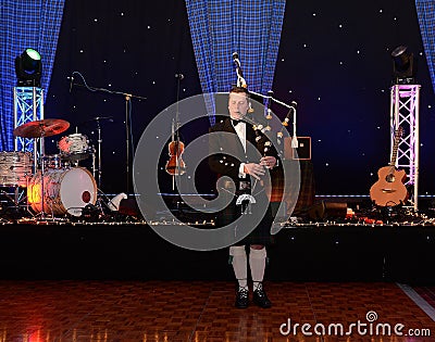 Scottish Bagpiper Editorial Stock Photo