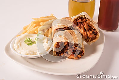 Traditional shawarma wrap with chicken and vegetables Stock Photo