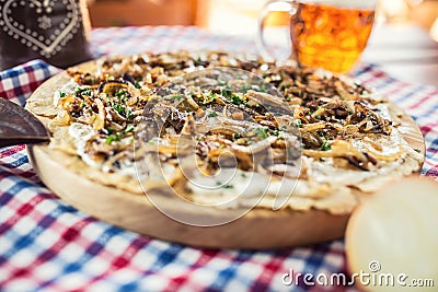 Traditional slovak potato pancake with fried onion bacon and che Stock Photo