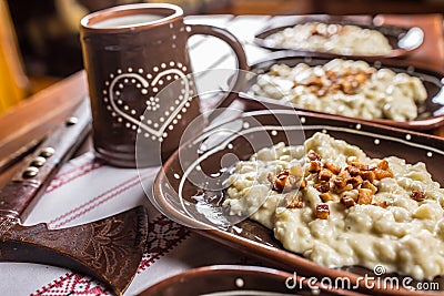 Traditional slovakian food Halusky with fried bacon and decorati Stock Photo