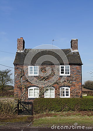 Traditional small English cottage Stock Photo