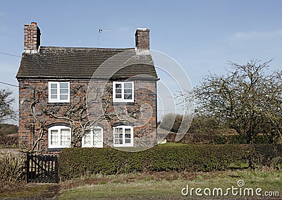 Traditional small English cottage Stock Photo