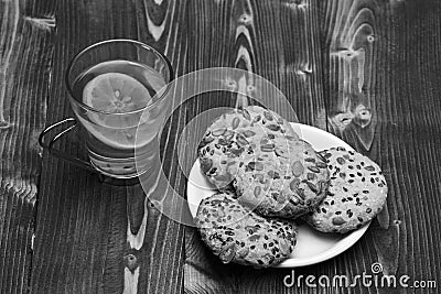 Traditional snack for tea time. Drink and homemade goods concept. Cookie made of oatmeal Stock Photo