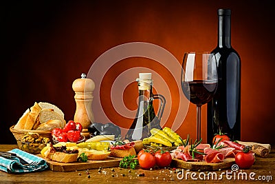 Traditional spanish tapas and red wine Stock Photo