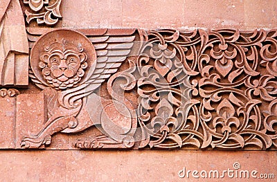 Traditional stone carving ornament on a wall of Armenian Orthodox Church Stock Photo