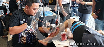 Traditional tattoo artwork at MBK Center Tattoo Fest 2018 Editorial Stock Photo