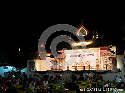 Traditional THAI dance greeting for market visitors on walking street, the CHIANG RAI NIGHT BAZAAR Editorial Stock Photo