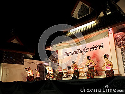 Traditional THAI dance greeting for market visitors on walking street, the CHIANG RAI NIGHT BAZAAR Editorial Stock Photo