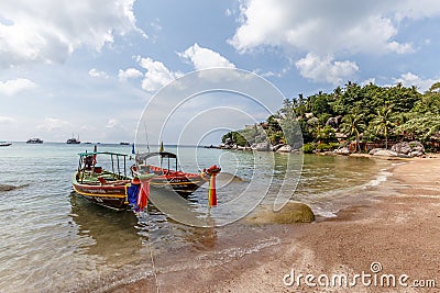 Traditional Thai longtail boats at the beach Editorial Stock Photo