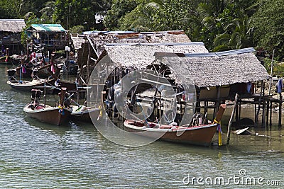 Traditional Thai riverside house village Stock Photo