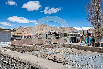 Traditional Tibetan wooden building in the downtown of Leh City, Ladakh, district of Kashmir Editorial Stock Photo