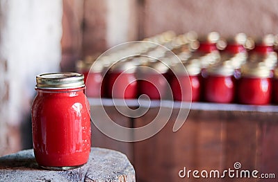 Traditional tomato sauce conserved in glass jar Stock Photo