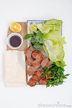 Traditional Turkish appetizer Cigkofte with lavash Stock Photo