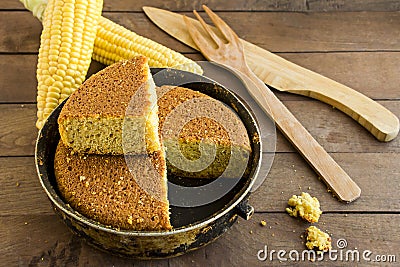 Traditional Turkish Corn Bread on the wooden table with fresh corns. Stock Photo