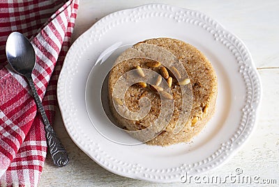 Traditional Turkish desserts Semolina halva with orange (Turkish name portakalli irmik helvasi Stock Photo