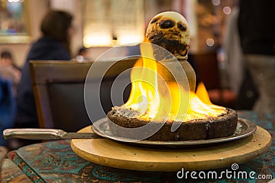 Tandir kebab in clay pot in flame Stock Photo