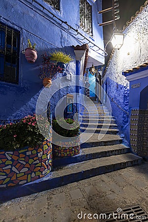 Traditional and typical moroccan architectural details in Chefchaouen, Morocco Africa Narrow and beautiful street of blue medina. Stock Photo