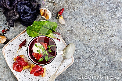 Traditional Ukrainian Russian borscht . Bowl of red beet root soup borsch with white cream . Beet Root delicious soup Stock Photo