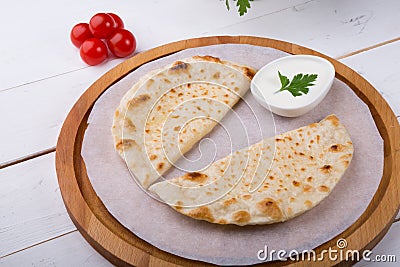 Traditional uzbek fried cheburek dough Stock Photo