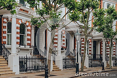 Traditional Victorian houses with stoops in Kensington and Chelsea, London, UK Stock Photo