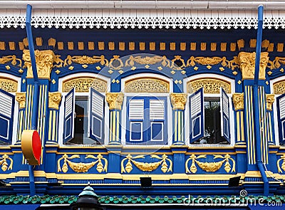 Traditional vintage Singapore house with a colorful decorative facade in the historical part of the city Stock Photo