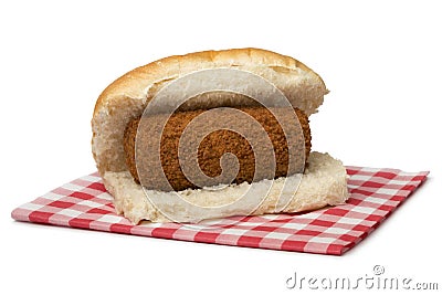 Traditional white bun with a Dutch kroket, called broodje kroket Stock Photo