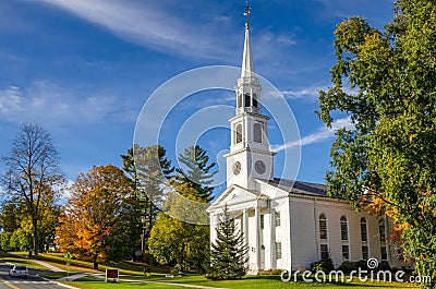 Traditional White Church and Blue Sky in Autumn Stock Photo