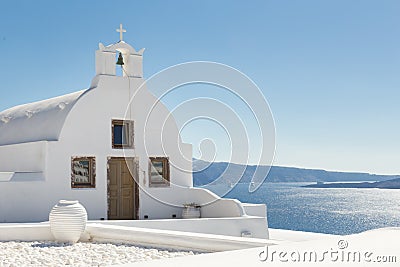 Traditional white orthodox church in Oia, Santorini, Greece. Stock Photo