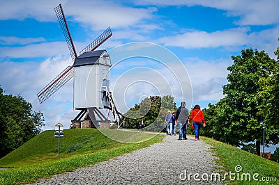 Traditional white windmill at the historical Bruges town Editorial Stock Photo