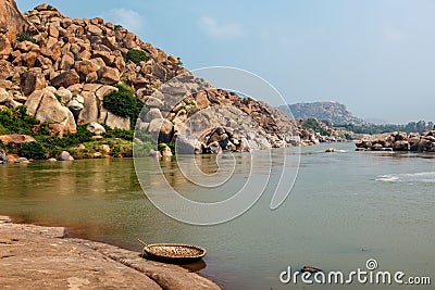 Wickerwork coracle boat in Hampi, Karnataka, India Stock Photo