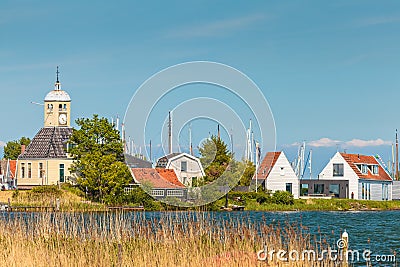 Traditional wooden houses in the small Dutch village of Durgerdam Stock Photo