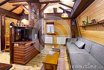 Traditional wooden interior with table and fixtures - mountain resort Stock Photo