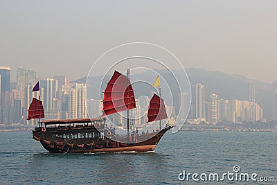 Traditional Wooden Sailboat sailing in Victoria Harbour in Hong Editorial Stock Photo