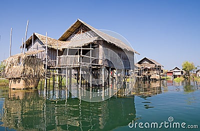 Traditional wooden stilt houses at the Inle lake Stock Photo