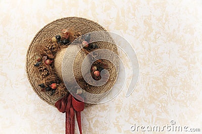 Traditionally decorated vintage handmade lady straw hat with floral bouquet Stock Photo