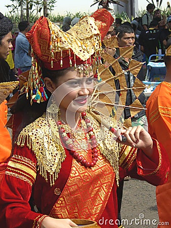 Traditionally dressed Indonesian girl Editorial Stock Photo