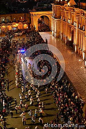 Traditionally dressed people during yearly anniversary celebration of white city Arequipa Editorial Stock Photo