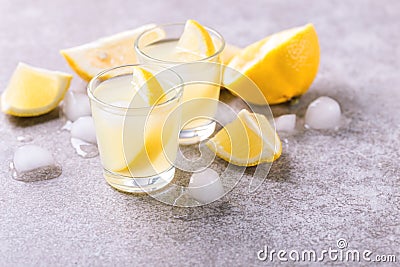 Italian lemon lime liqueur limoncello with ice and mint Stock Photo