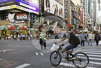 Traffic agent uses humor to brighten NYC while working Editorial Stock Photo