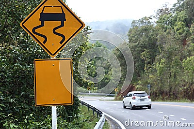 Traffic alerts sign and car driving Stock Photo