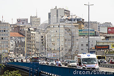 Traffic at Branko bridge with driving vehicles and pedestrians walking,with the view on the city Editorial Stock Photo