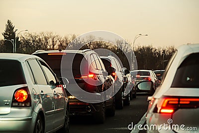 Traffic. cars caught in the crowd. photo taken in the evening. people in traffic returning from work. Stock Photo