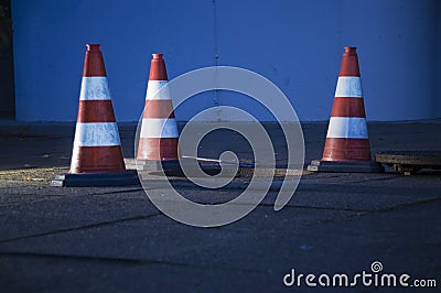 Traffic cones around manhole Stock Photo