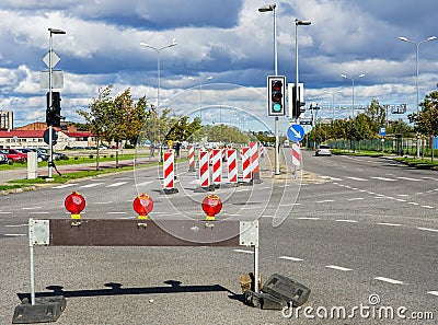 Traffic constraints during street repairs, warning signs Stock Photo