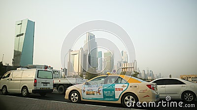 DUBAI, UAE - AUGUST 20, 2014: Traffic in Dubai in a summer day. Editorial Stock Photo