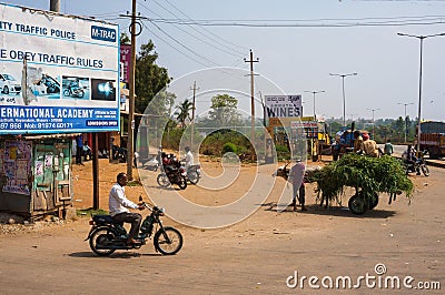 Traffic on a dusty parking lot and street in Bengaluru, India Editorial Stock Photo