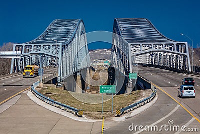 Traffic flows from Jefferson City Missouri across the Missouri River on U.S. 54/63 - Missouri River Bridge Editorial Stock Photo