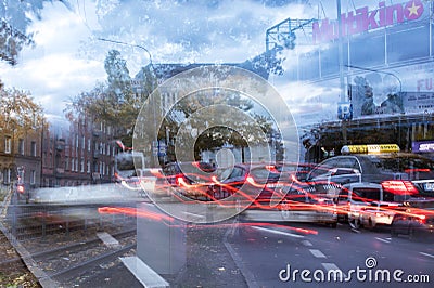 Traffic jam, colorful city and cars lights, blurred by speed and motion. A streak of light, trails. Poznan, Poland. Editorial Stock Photo