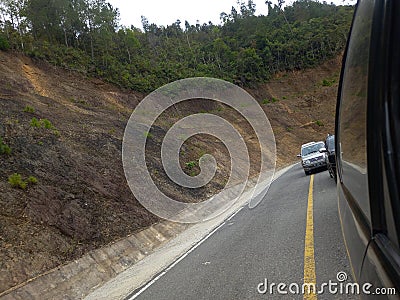 Traffic jam on the mountain side road to lake toba Editorial Stock Photo