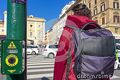 traffic light activation button for pedestrians crossing the crosswalk in Rome, Italy. Editorial Stock Photo